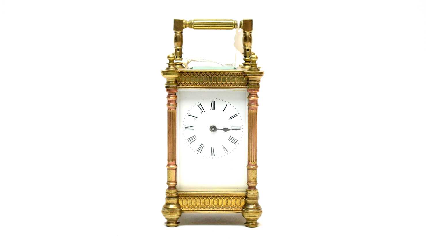 A late 19th Century brass carriage clock.