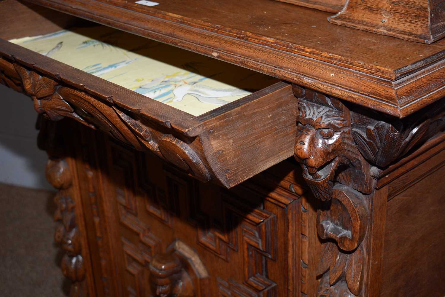 A profusely carved North European 19th C oak bookcase cabinet. - Image 10 of 12