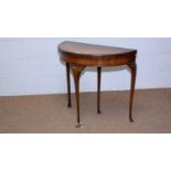 A mid 20th Century burr walnut and banded demilune card table.
