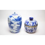 Two Chinese blue and white jars and covers.