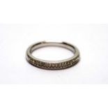 A diamond half hoop eternity ring,