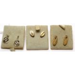 Three pairs of diamond earrings,