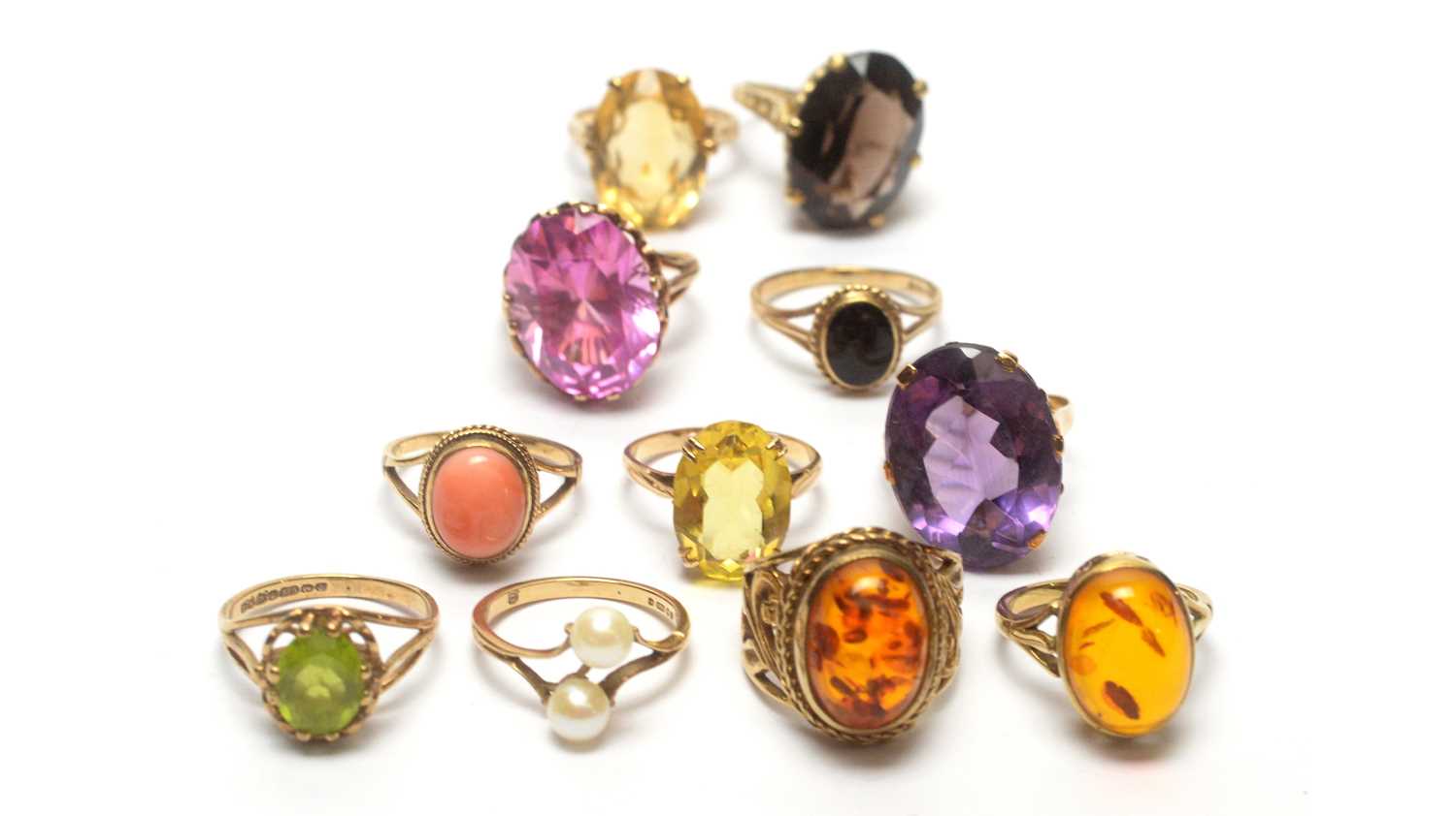 Eleven gemstone set dress rings,