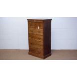 A mahogany chest of drawers.