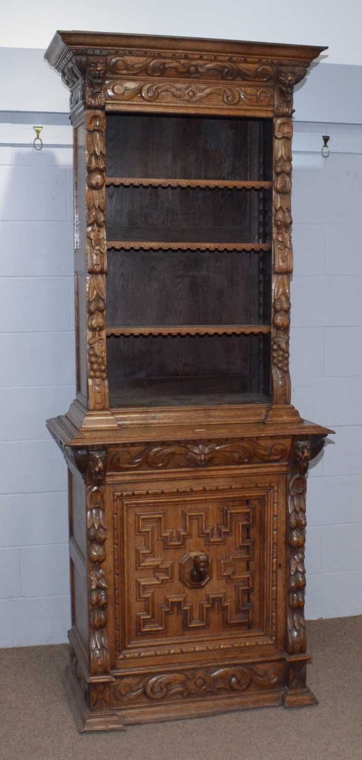 A profusely carved North European 19th C oak bookcase cabinet. - Image 9 of 12