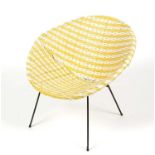 A mid Century plastic rattan weave Atomic Sputnik bedroom tub chair