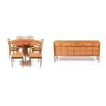 Nathan Furniture: an eight piece teak dining room suite including a 'Squares' sideboard.