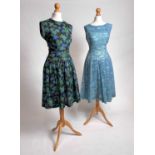 Two 1950s ready-to-wear day dresses | in painterly blue and green prints