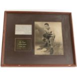 Joe Louis (1914-1981): a signed black and white photograph,