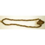 A Vere necklace, Cameroon, Nigeria, the main brass beaded and scroll design disc drop on cord with
