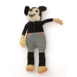 A Walt Disney Productions Mickey Mouse felt soft toy.