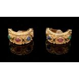 Christian Dior: a pair of gilt-metal and coloured plastic clip earrings,