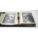 A large quantity of photographs and other images of Alice Faye.