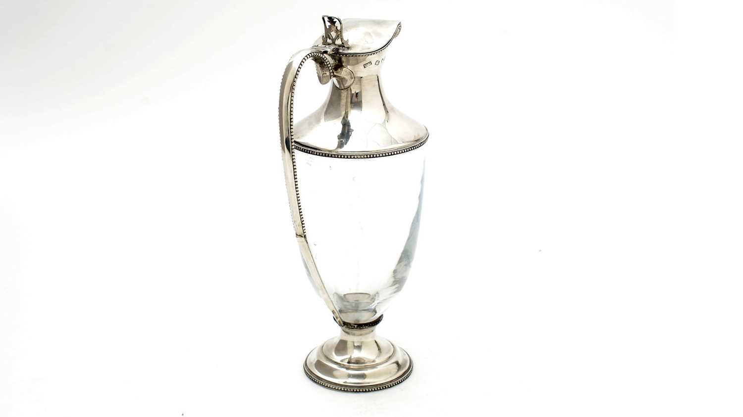 An Elizabeth II silver mounted glass claret jug, by Mappin & Webb,