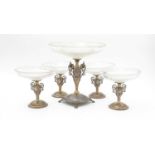 A suite of German 800 standard silver-gilt and cut glass tazzas,