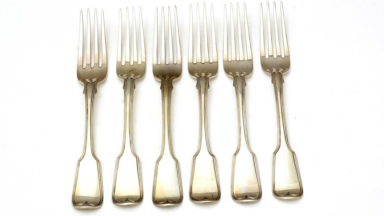 Six William IV silver table forks,