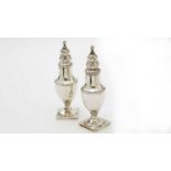 A pair of George III silver pepperettes, by James Mince,