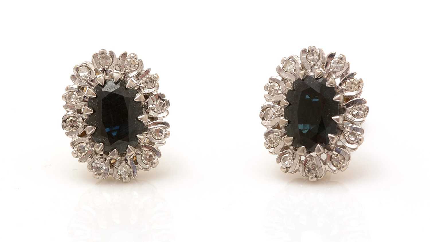 A pair of sapphire and diamond cluster earrings,