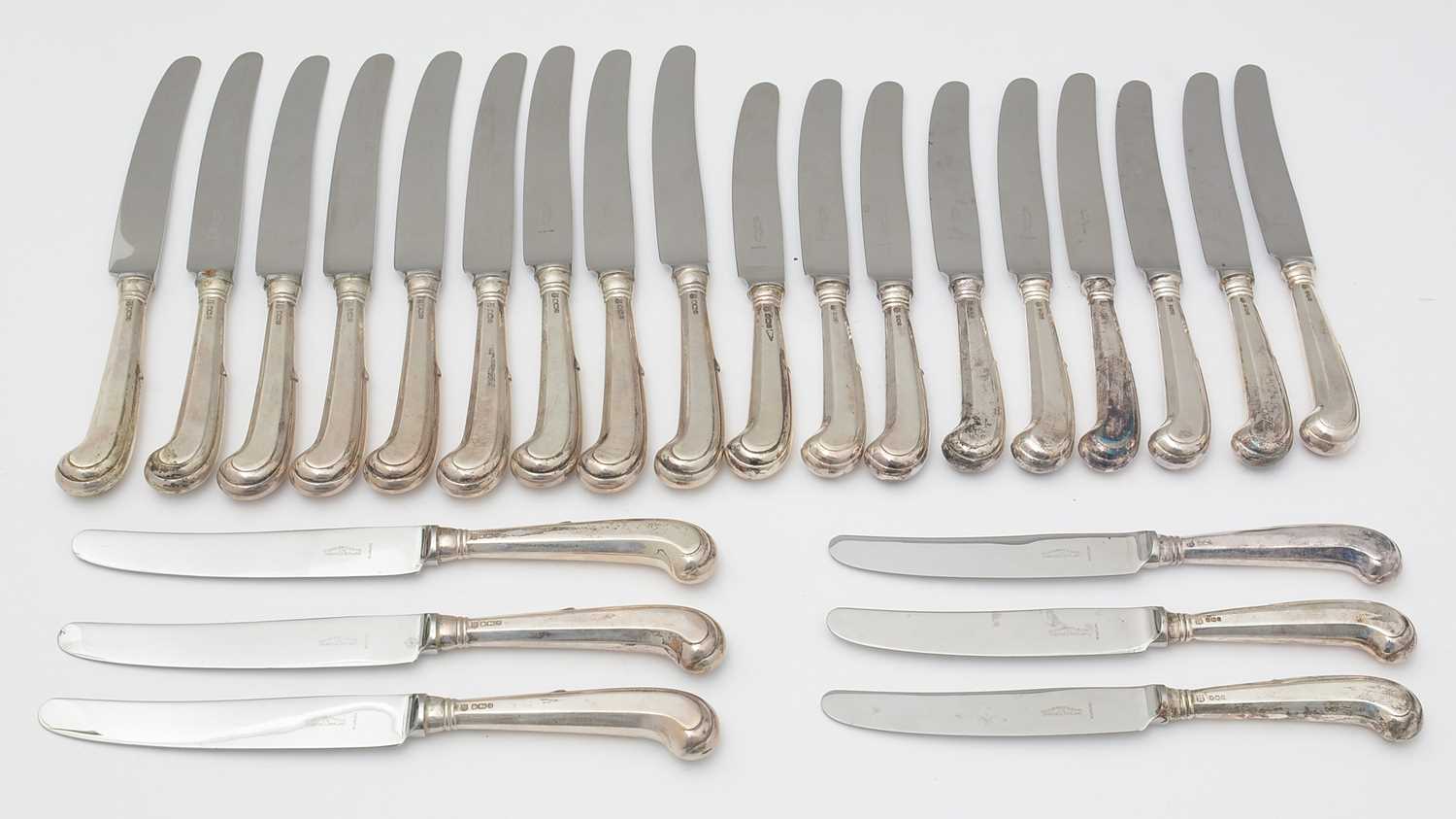 A set of silver mounted table knives, by Cooper Brothers & Sons,