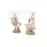 Pair of French porcelain sweetmeat figures