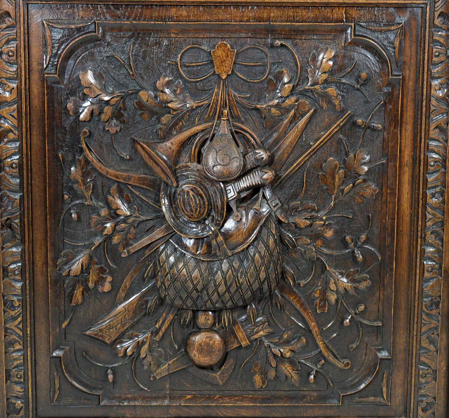 A richly carved Victorian oak side/pier cabinet with a sporting theme. - Image 20 of 37