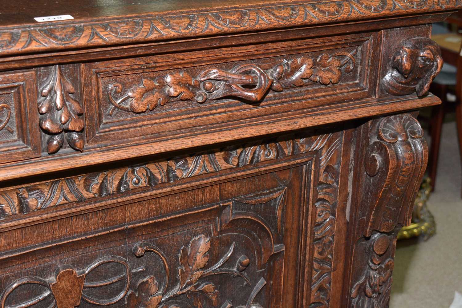 A richly carved Victorian oak side/pier cabinet with a sporting theme. - Image 29 of 37