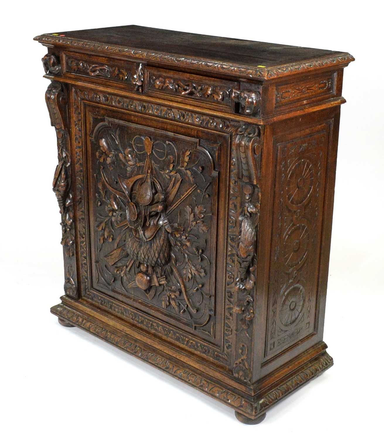 A richly carved Victorian oak side/pier cabinet with a sporting theme. - Image 18 of 37