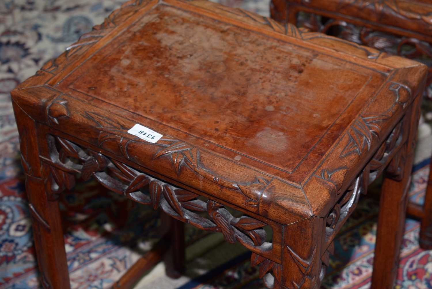 A nest of three Chinese carved huanghuali occasional tables - Image 10 of 19