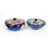 Two Moorcroft Hibiscus pattern powder bowls and covers.