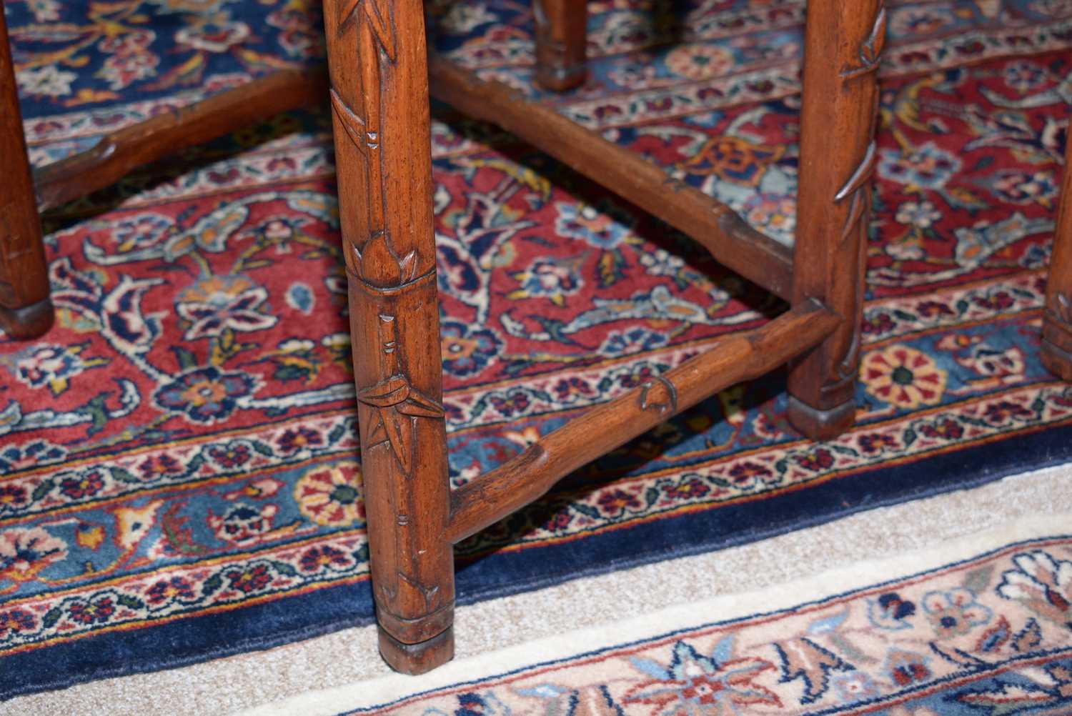 A nest of three Chinese carved huanghuali occasional tables - Image 7 of 19