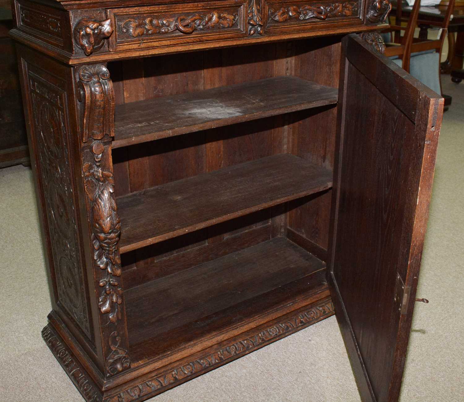 A richly carved Victorian oak side/pier cabinet with a sporting theme. - Image 6 of 37