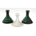 A pair of 19th Century green conical decanters, and another.