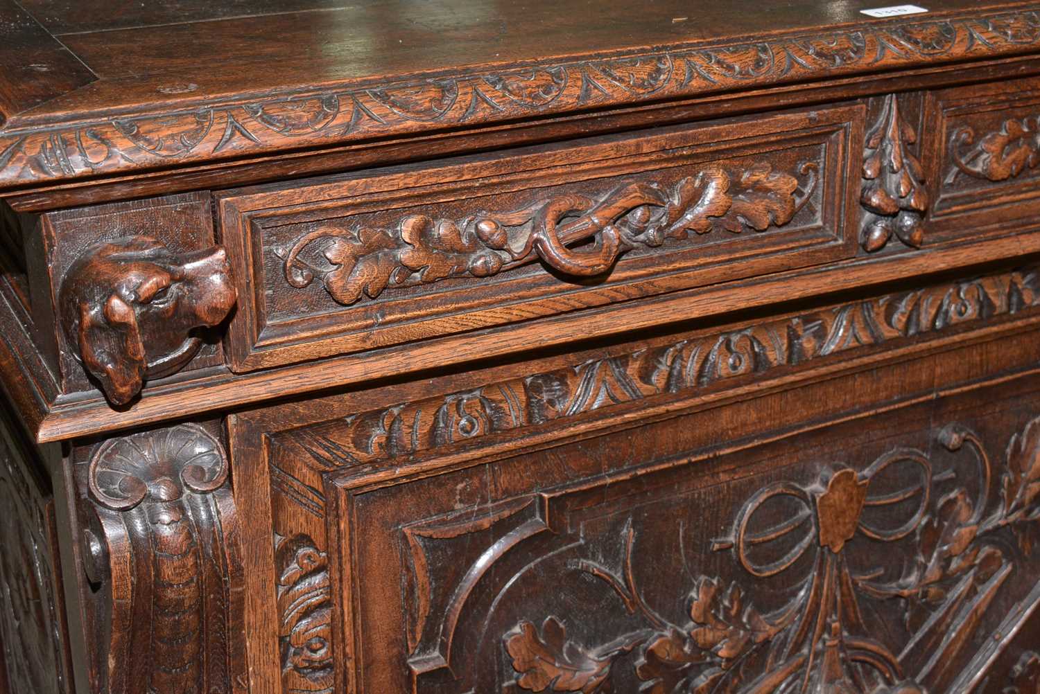 A richly carved Victorian oak side/pier cabinet with a sporting theme. - Image 10 of 37