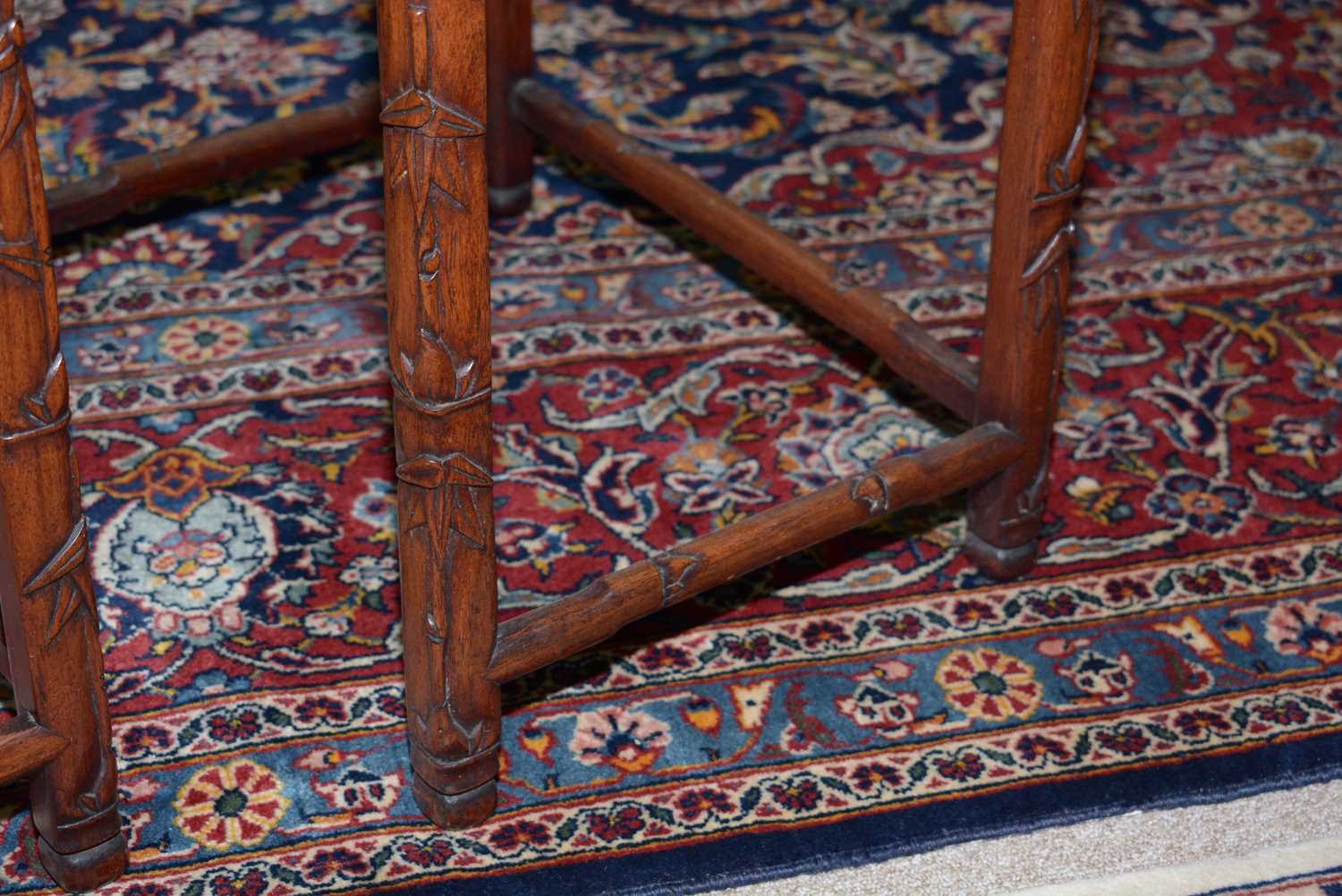 A nest of three Chinese carved huanghuali occasional tables - Image 6 of 19