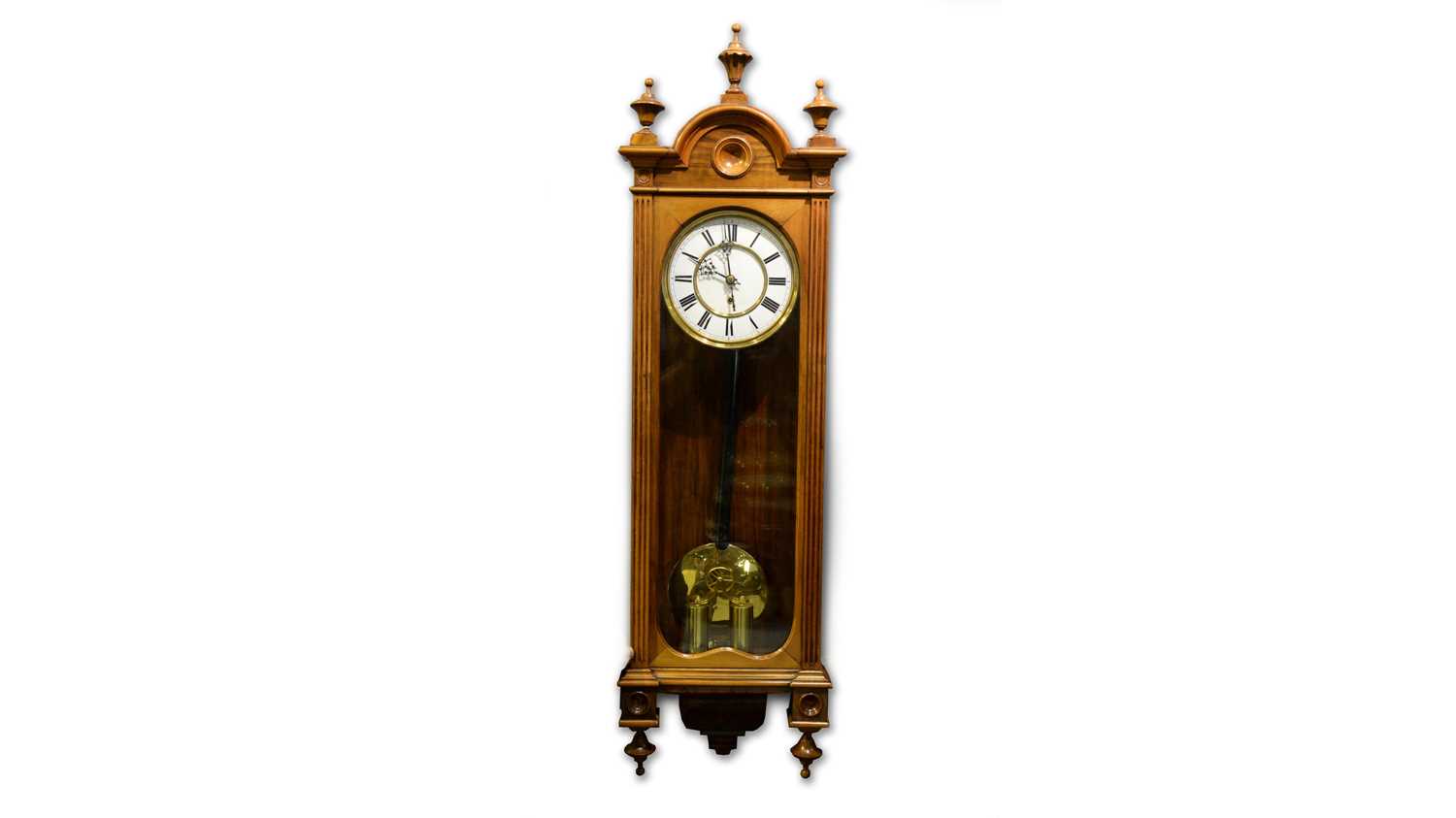 A Viennese burr walnut wall timepiece.