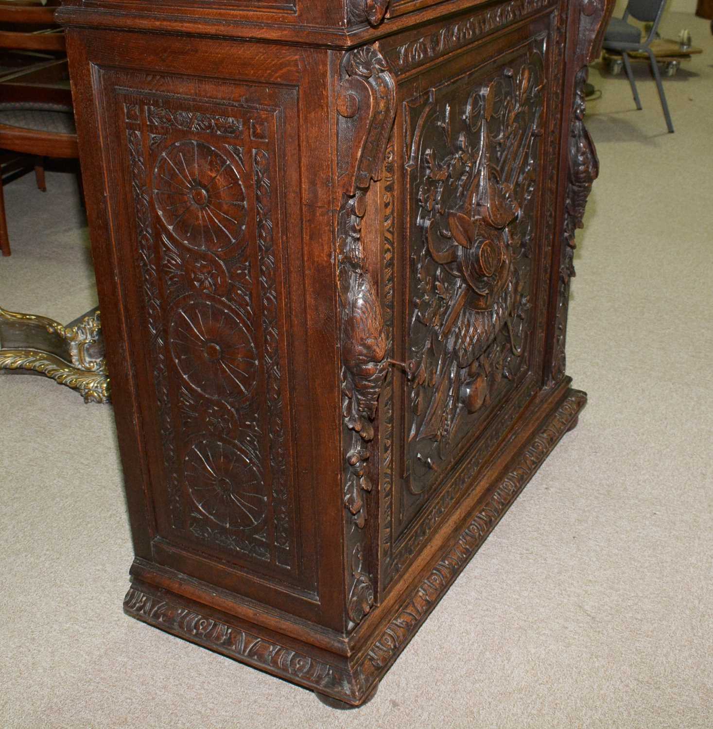 A richly carved Victorian oak side/pier cabinet with a sporting theme. - Image 26 of 37