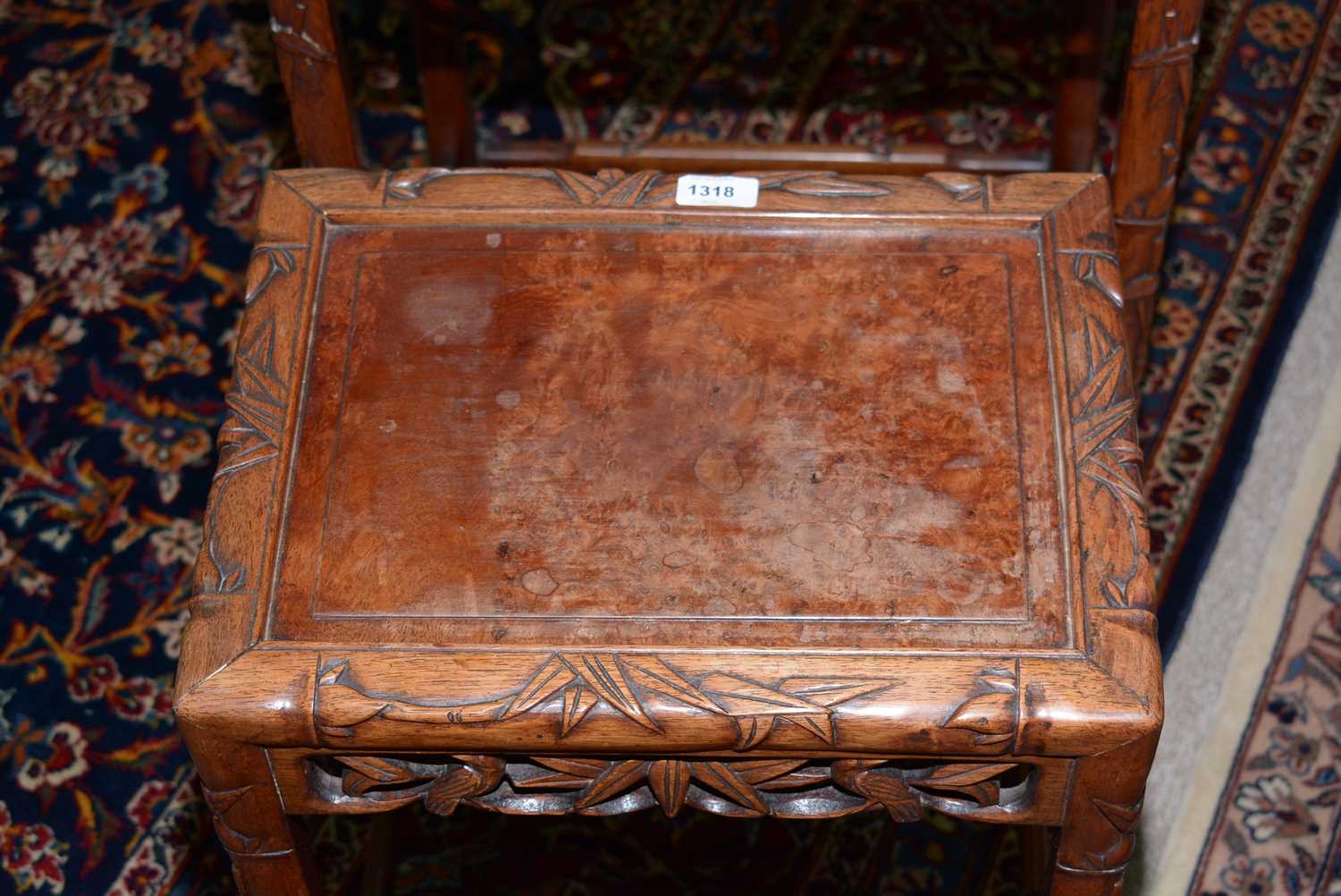 A nest of three Chinese carved huanghuali occasional tables - Image 9 of 19