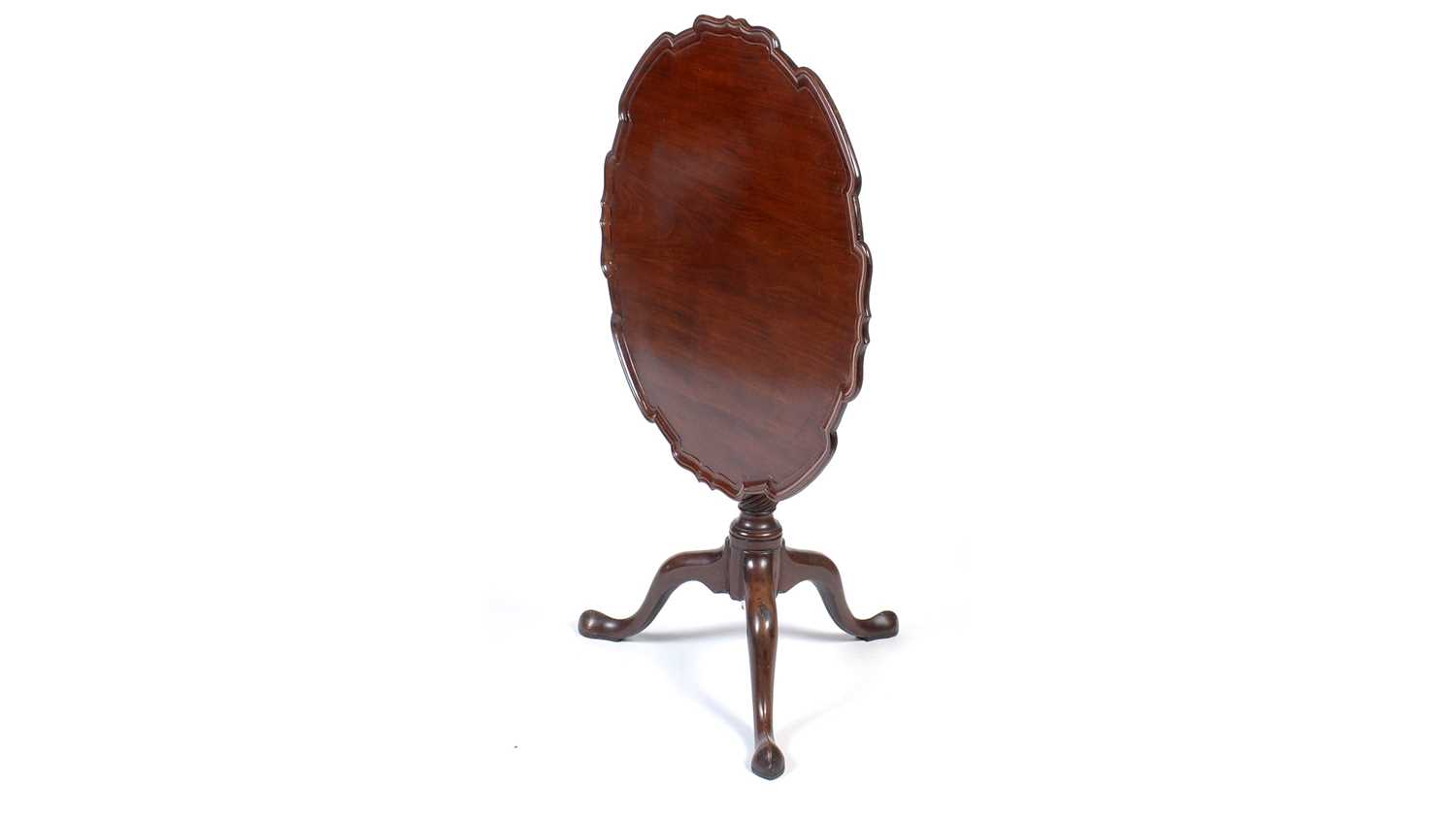 A George III mahogany tilt-action tripod table.