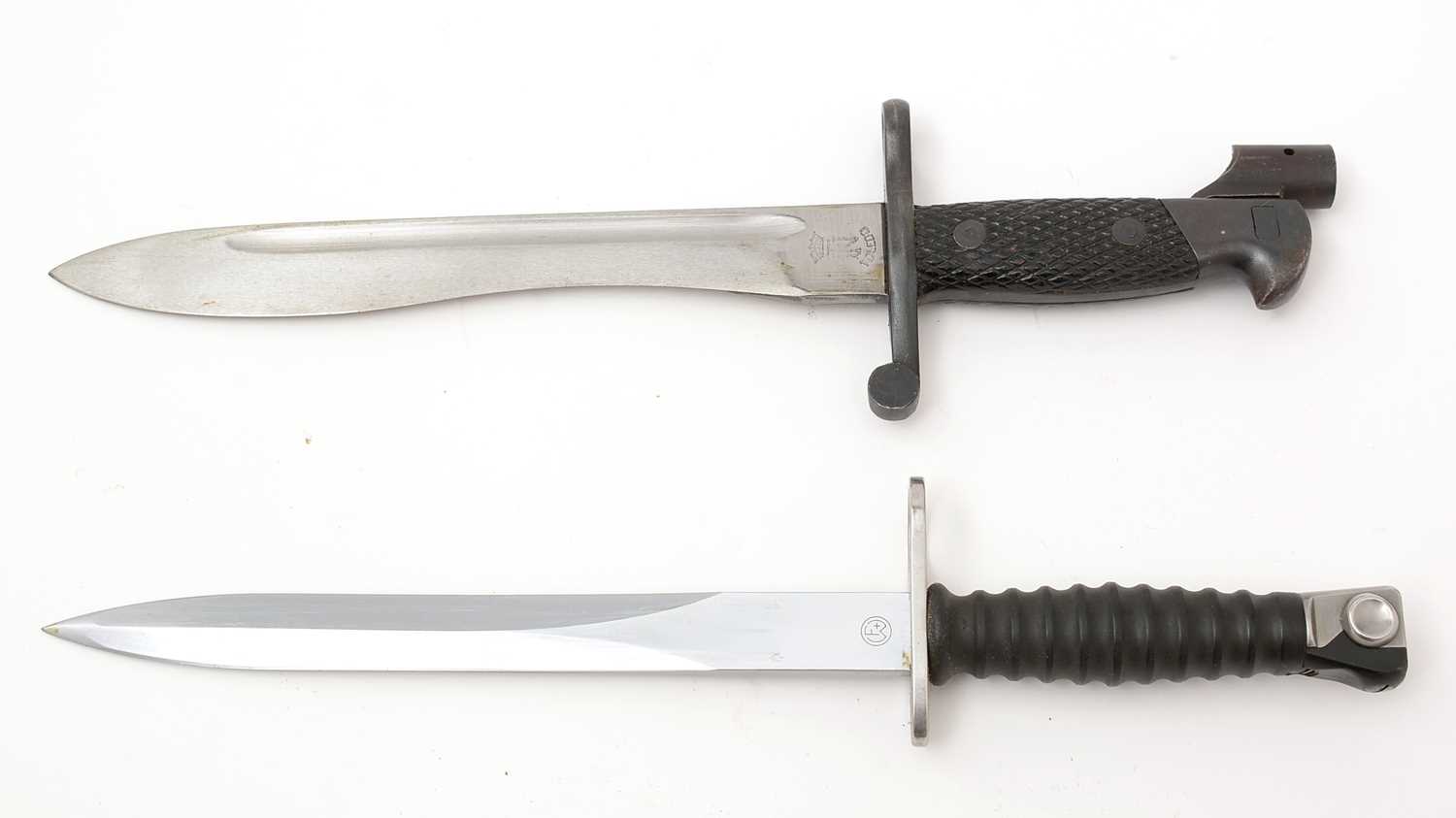 A Spanish WWII bayonet and a Swiss SIG bayonet