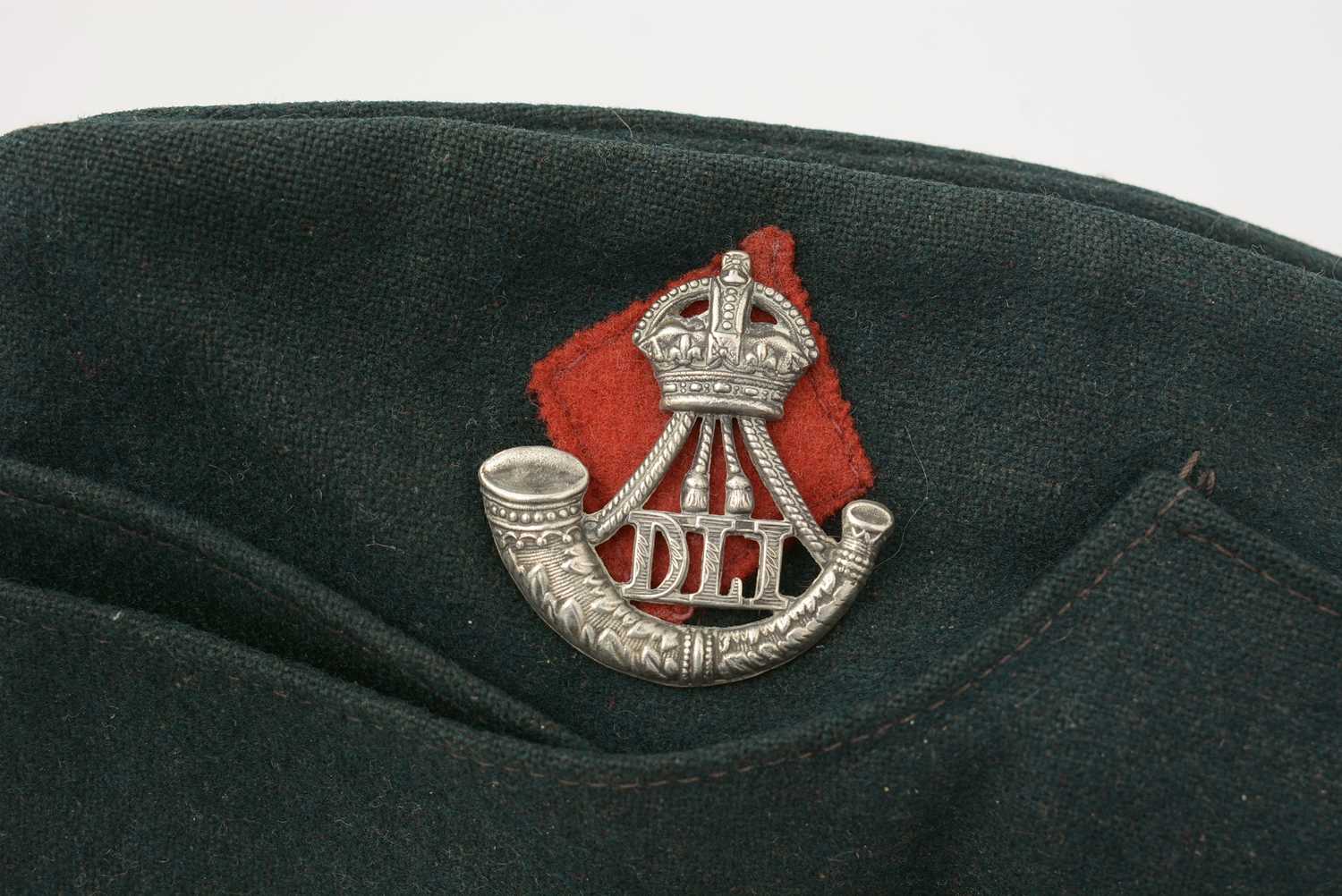 DLI interest caps and badges. - Image 10 of 13