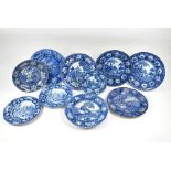 Nine early 19th century blue and white transfer-printed pottery plates and di