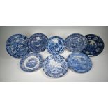 Twenty-two early 19th century blue and white pottery plates and dishes