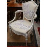 A French carved and cream painted shield back salon chair