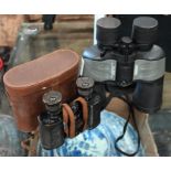 Two pairs of binoculars