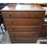 An oak chest of five long graduating drawers