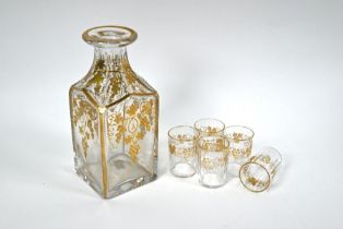A 19th century square-cut decanter and matching shot glasses