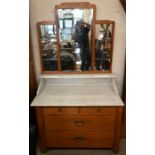 An early 20th century German Arts & Crafts light oak mirror-backed wash stand