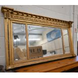 A Regency style gilt wood and gesso framed wall mirror