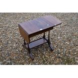 Pair of Victorian rosewood dining chairs and a Sutherland table