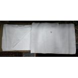 Two white damask table cloths